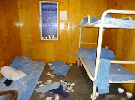 Photos from the report give a glimpse into the dingy conditions at Baffin Correctional Centre.
